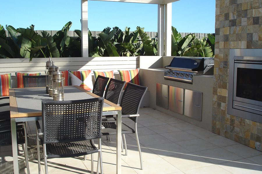 minimalist covered big balcony with kitchen appliances